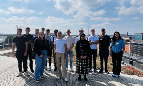 A group of apprentices on top of the roof at The Place