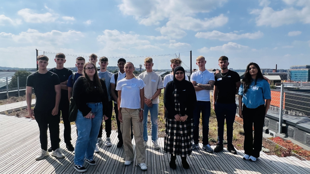 A group of apprentices on top of the roof at The Place